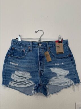 Levi's Distressed Denim Cutoff Shorts - Medium Blue